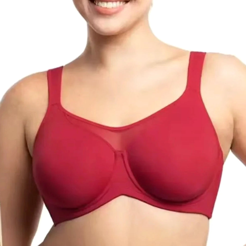 Lovelle Skin Support i vinrød på smilende modell: høyt midtpanel og brede stropper